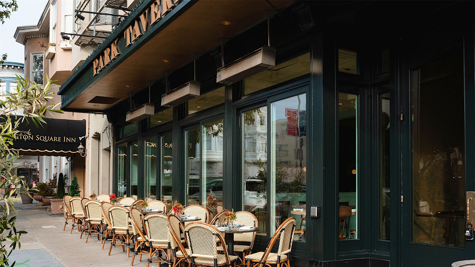 The exterior and patio seating at Park Tavern on Washington Square in San Francisco